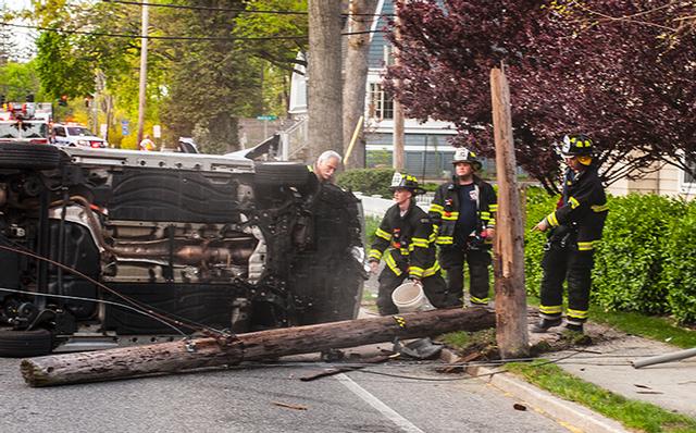 RFD units operating at a single car MVA rollover at the intersection of Forest Ave and Oakwood Ave. Photo courtesy of RFD FF Lester Millman 
