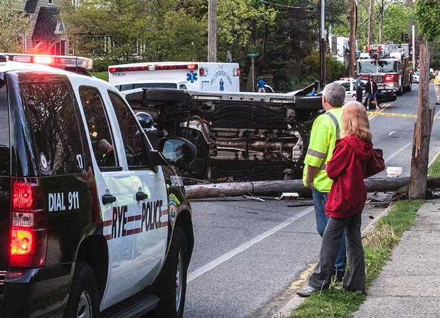 RFD units operating at a single car MVA rollover at the intersection of Forest Ave and Oakwood Ave.  Photo courtesy of RFD FF Lester Millman 