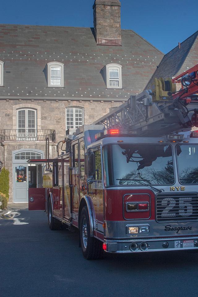 Ladder 25 in front of the Wainwright House for a water condition.  Water was leaking from second floor to first while trying to prepare for a wedding later that day!  3/30/13 Photo courtesy of RFD Firefighter Lester Millman