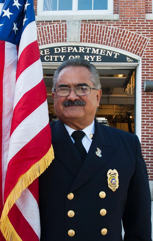 Former US Marine and current member of Rye FD Arcadio Ocasio stands in front of HQ. Photo by RFD FF Lester Millman 