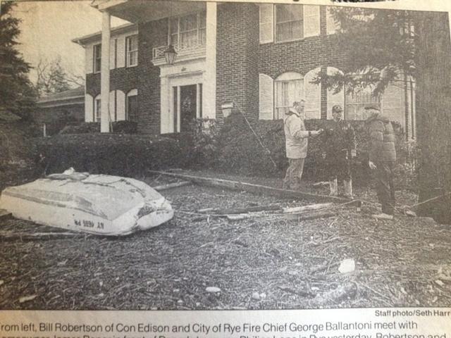 The Late Ex Chief George Ballantoni surveying damage to a home on Philips Lane. 