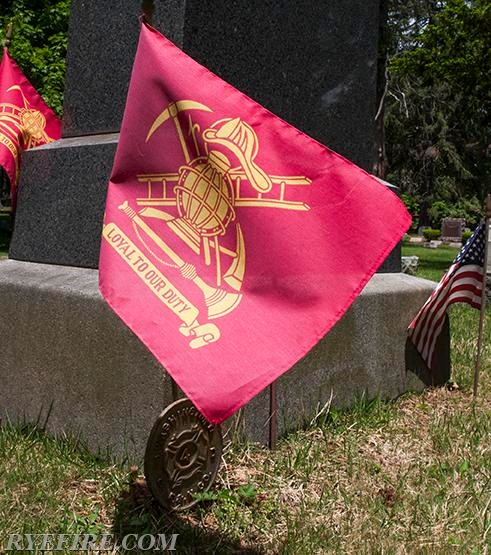 Placing Flags at the cemetery in honor of Memorail Day, an annual tradition.  Photo by RFD Official Photographer Lester Millman  