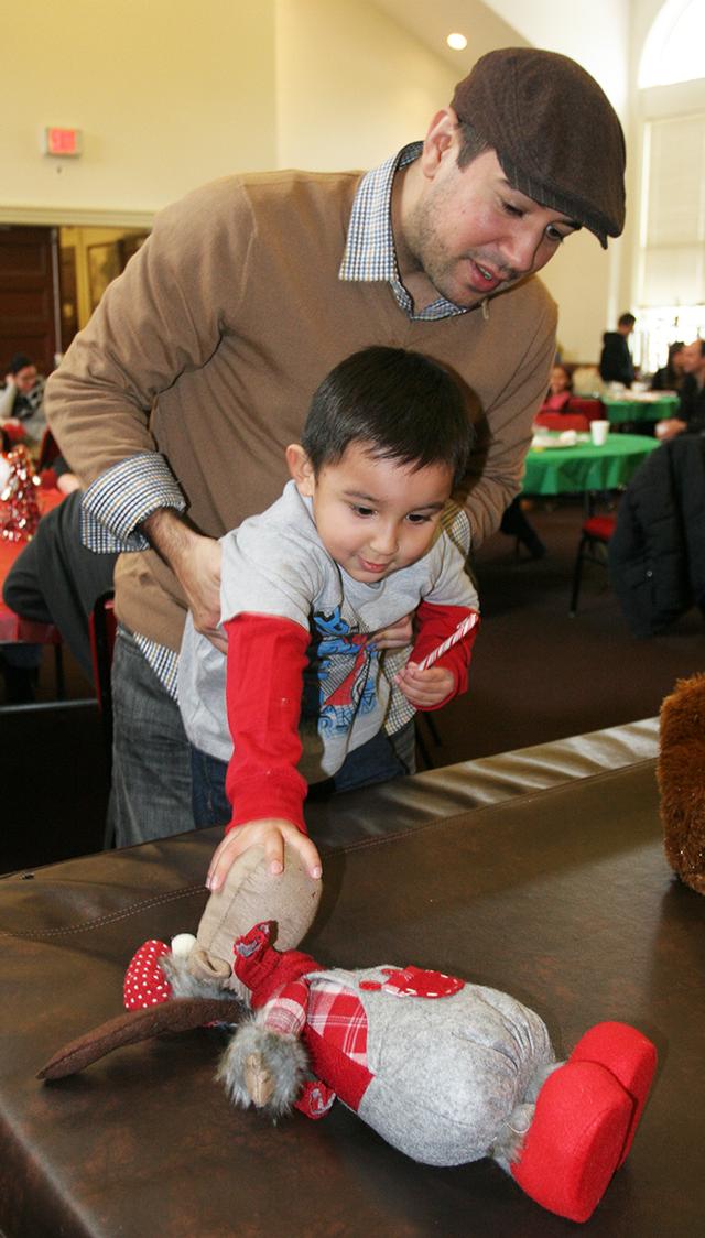 Santa stopped by RFD HQ to the delight of many kids at RFD's Children's Christmas Party 12/15/13 Photo by RFD FF Lester Millman 