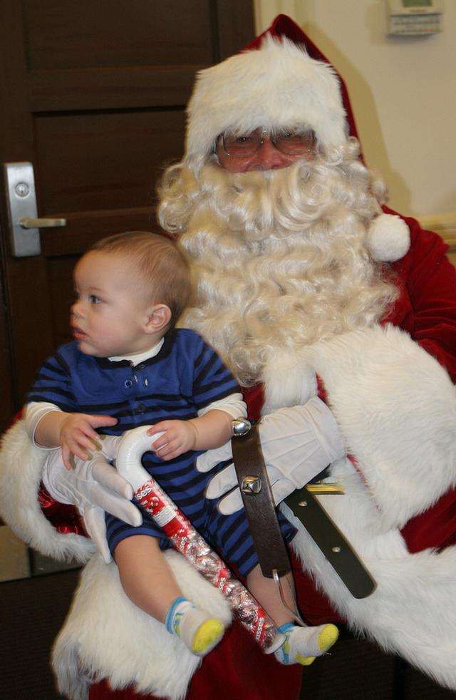 Santa stopped by RFD HQ to the delight of many kids at RFD's Children's Christmas Party 12/15/13 Photo by RFD FF Lester Millman 