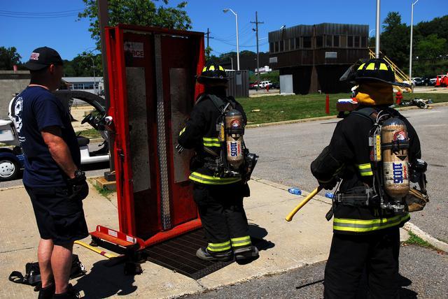 FF Rodriguez and Lt Billington practicing forcible entry at The Westchester County Fire Training Center in Valhalla 7/29/2011