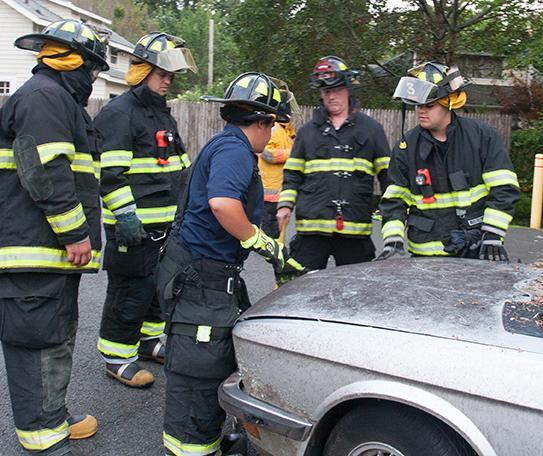 Firefighters practiced extrication techniques for one of July's monthly drills 7/24/13. Photo by RFD FF Lester Millman 